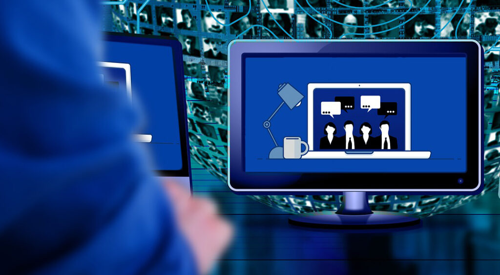 En blå dataskärm som visar ett digitalt möte.